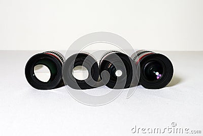 Eyepieces for a telescope close-up on a white background Stock Photo