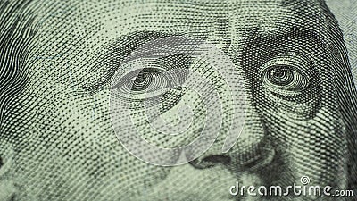 Eyes of Benjamin Franklin 100 dollars note close-up Stock Photo