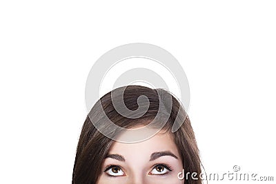 Eyes of brunette woman looking up dumbfounded Stock Photo