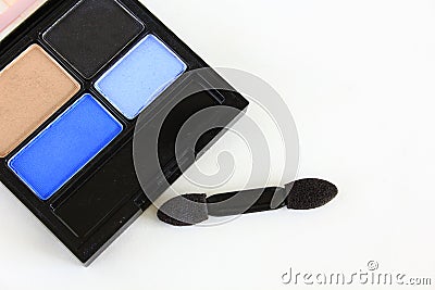 Eyeshadow and eyeshadow brush Stock Photo