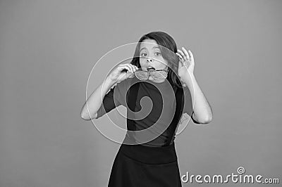 Eyewear fashion shop. Party accessory. Having fun. Carnival party. Masquerade concept. Kid and striped eyeglasses. Girl Stock Photo