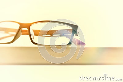 Eyewear on wood table front view vintage Stock Photo