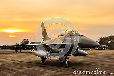 F16 falcon fighter jet on sunset background Stock Photo