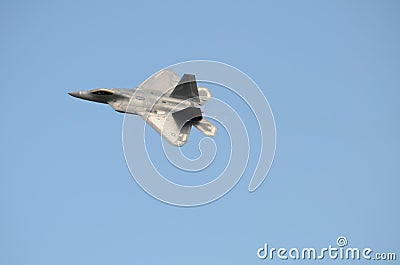 F22 Raptor fighter jet against a blue sky Editorial Stock Photo