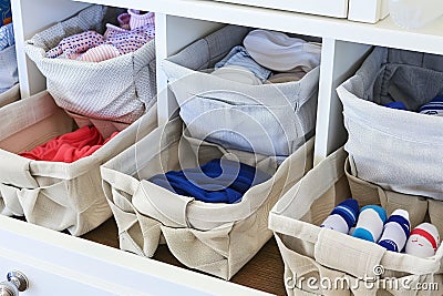 fabric baskets as drawer organizers for socks and underwear Stock Photo