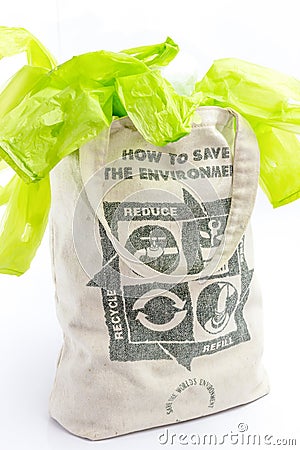 Fabric eco bag with recycle sign icon made of green leaf Stock Photo