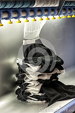 Fabric made by industrial knitting machine Stock Photo