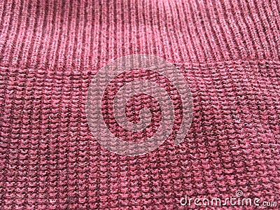 The fabric of the red sweater is close. Abstract texture. Stock Photo