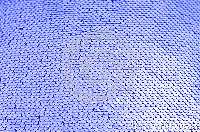 Fabric texture with shimmering blue sequins. Stock Photo