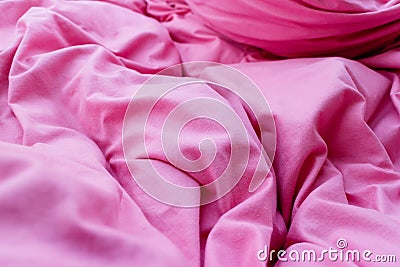 Detailed closeup of pink quilt bedding Stock Photo