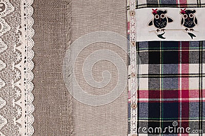 Fabrics background. Linen fabric, sackcloth, plaid flannel shirt Stock Photo