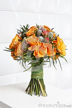 Fabulous bouquet of orange roses and other flowers Stock Photo