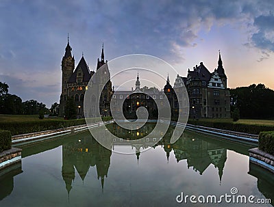 Fabulous castle in Moszna in the night, near Opole, Poland Stock Photo