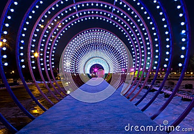 Fabulous illuminated tunnel in Moscow central park Stock Photo