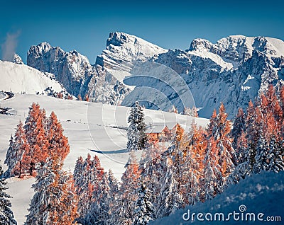 Fabulous morning view of Alpe di Siusi village with Furchetta peak on background. Stock Photo