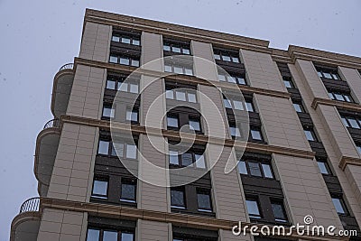 Facade of a brown building. Stock Photo