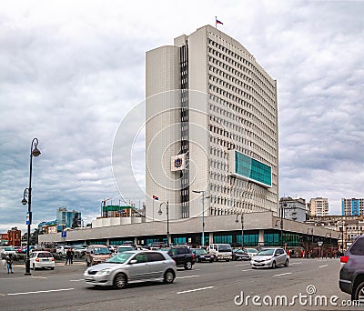 The facade of the building of the Administration of Primorsky Krai and the roadway of Svetlanskaya Street in the Far Eastern city Editorial Stock Photo