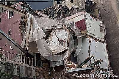 Facade of a building collapsed in an explosion Editorial Stock Photo