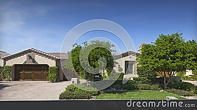 Facade of bungalow across the road Stock Photo