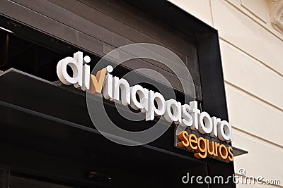 Facade of the commercial premises of the insurer Divina Pastora Editorial Stock Photo