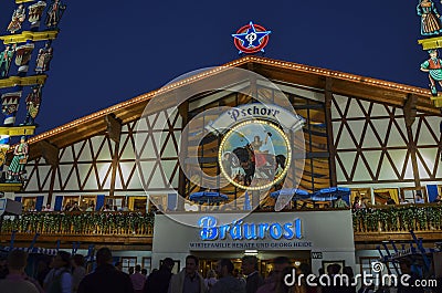 Facade and entrance of the Pschorr brewery tent at beer festival Oktoberfest in Munich Editorial Stock Photo