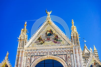 Facade Exterior Christ Crowning Mary Cathedral Church Siena Italy. Stock Photo