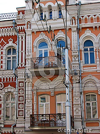 Facade fragment of art nouveau building with arch windows Stock Photo