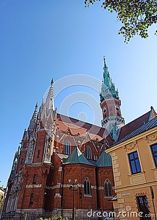 The facade of the Neo Gothic architecture style St. Joseph`s Church in Krakow, Poland Stock Photo