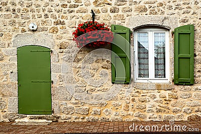 Facade olive green color and flowers Stock Photo