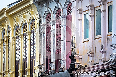 Facade perspective of ancient buildings. Colorful facade, arched windows in antique style. Stock Photo