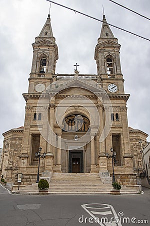 Facade and portal to cathedral, Basilica in Alberobello imposing exterior Editorial Stock Photo