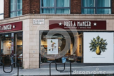 Facade of a Pret A Manger shop in King`s Cross, London, UK. Editorial Stock Photo