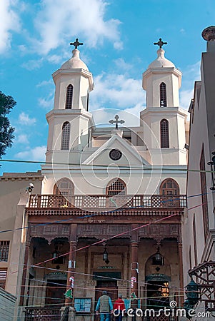 Facade of a small Coptic church with a wooden column porch in the Christian quarter of Cairo Editorial Stock Photo