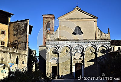 Facade in the sun and blue sky of the church of San Bartolomeo in Pistoia. Editorial Stock Photo