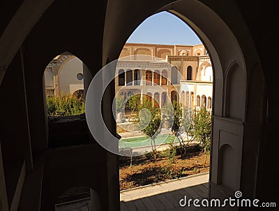 Facade, terraces and arches of Ameri traditional palace house in the oasis city of Kashan, in the Isfahan province of central Iran Stock Photo