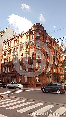 Facade view of a neoclassical brick building, in Republica Arabe and Cabello streets. Buenos Aires, Argentina Stock Photo