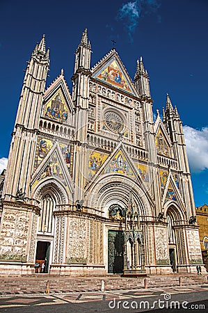 Facade view of the opulent and monumental Orvieto Cathedral in Orvieto. Editorial Stock Photo