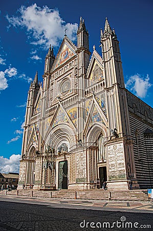 Facade view of the opulent and monumental Orvieto Cathedral in Orvieto. Editorial Stock Photo