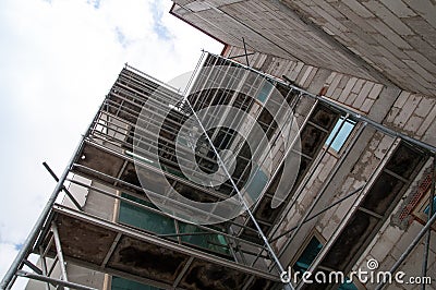 Facade work on multi-storey buildings Stock Photo