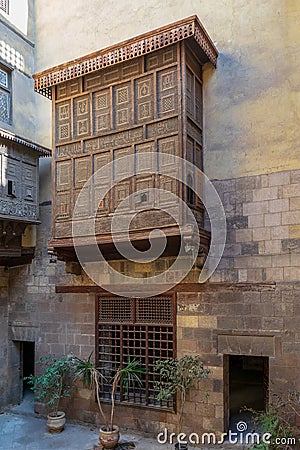 Facade of Zeinab Khatoun historic house with Mamluk era style oriel window Mashrabiya, Cairo, Egypt Stock Photo