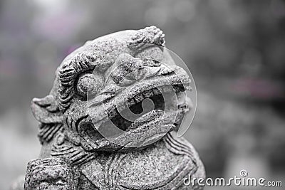 Face of ancient Chinese lion guardian Stock Photo