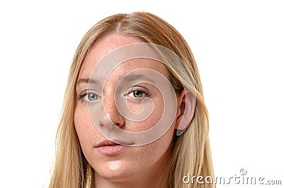 Face of an attractive serious blond woman Stock Photo