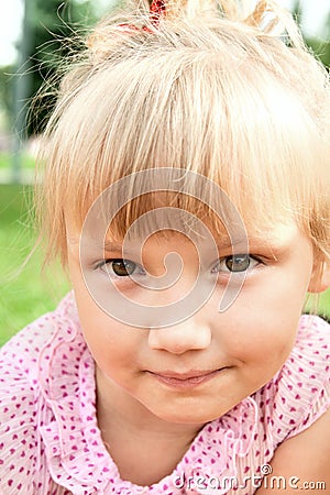 Face of beautiful litle girl Stock Photo