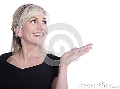 Face of a beautiful older woman looking sideways and presenting. Stock Photo