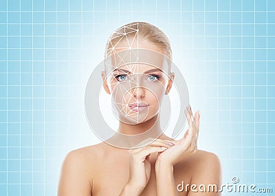 Face of a beautifyl girl with a scanning grid on her face. Face id, security, facial recognition, authentication Stock Photo