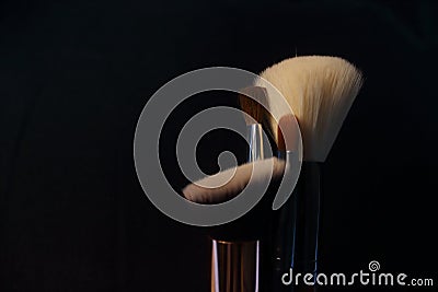 Face brushes on a black background Stock Photo