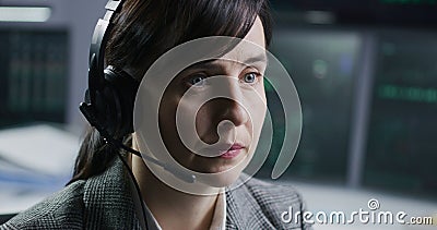 Face close up of female stock trader in headset Stock Photo