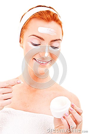 Face cream woman applying skin cream under eyes. Beauty eye Stock Photo