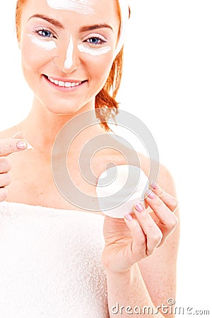 Face cream woman applying skin cream under eyes. Beauty eye Stock Photo