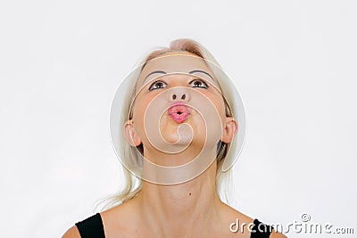 Face exercise blow the air Stock Photo